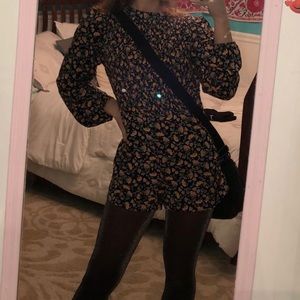 A black floral romper from Urban Outfitters